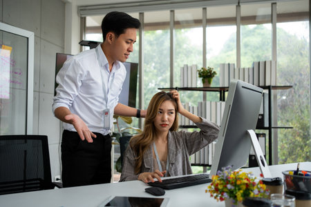 Stressed of female employee and offensive faces that the boss yells, Workplace Conflict, Corporate Communication Problem, stress of business partner discussing, Quarrels, And Bad Attitude At Workの写真素材