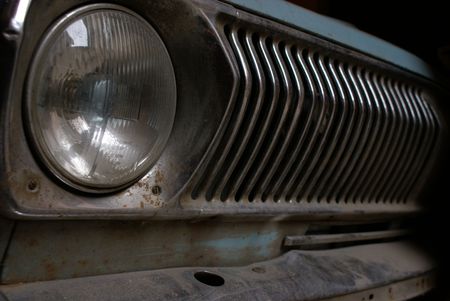 Old soviet rusted car "Volga" in a garadgeの写真素材