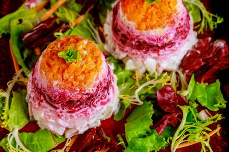 Russian beetroot salad with herring and vegetable.の写真素材
