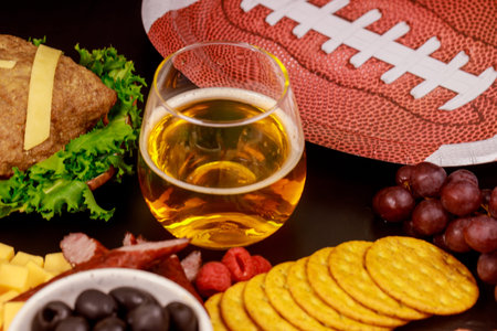Beverage and snacks for superball american football game fans.