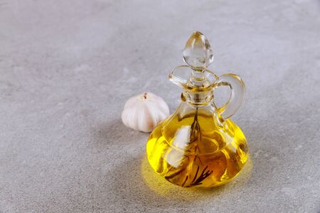 Organic extra virgin olive oil with rosemary. Healthy food concept.の写真素材