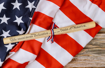Fourth of July Day. Declaration of Independence parchment roll document with US flag on white...