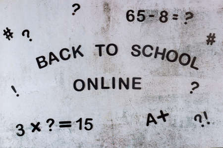 Text back to school online with eguation on white board. School concept.の写真素材