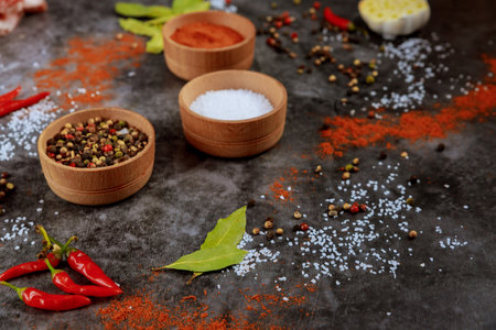 Various of herbs and powder spices on dark background.の写真素材