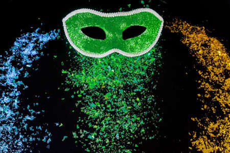Green carnival mask for masquerade. Jewish holiday Purim.の写真素材