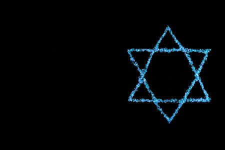 Blue star of David. Jewish symbol on black background.