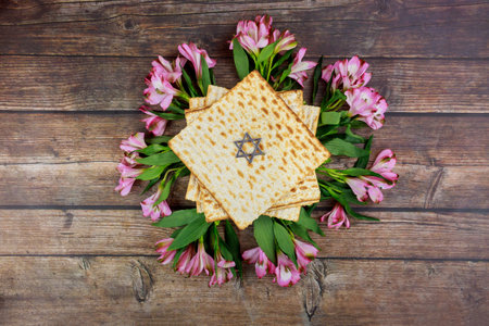 Passover background with matzah and flowers. Jewish holiday.の写真素材