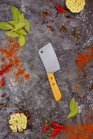 Various herbs and spices with knife. Top view.の写真素材