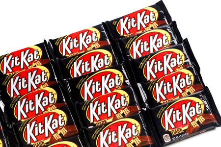May 4, 2021. New York. Kit Kat wafer bar coated with dark chocolate isolated on a white background....