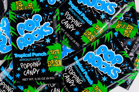 May 4, 2021. New York, US. Sour popping candy Pop Rocks tropical punch on white background.