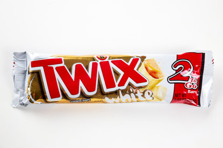 May 4, 2021. New York, US. Twix white chocolate cookie bars with caramel on white background.のeditorial素材