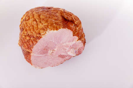 Whole pork ham isolated on white background. Meat, meal.の写真素材