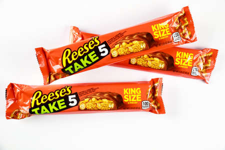 May 4, 2021. New York. Reeses with pretzels and caramel milk chocolate bar isolated on a white background.のeditorial素材