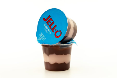 February 3, 2023. Spartanburg, SC USA. Jello-O chocolate vanilla pudding snacks in a plastic cup.のeditorial素材