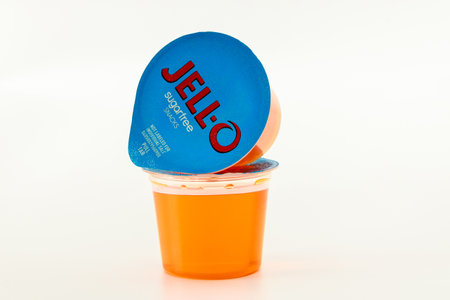 February 3, 2023. Spartanburg, SC USA. Gelatin snack package in plastic with Jello-O orange gelatin.のeditorial素材