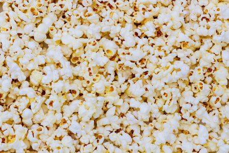Background of white popped popcorn texture. Close up.