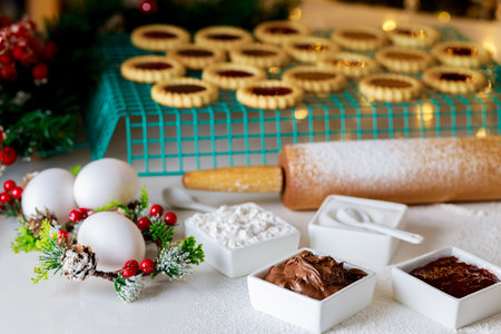 Ingredients for making christmas cookies with jam.の写真素材