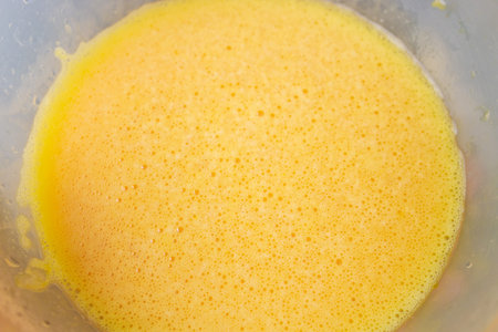 Eggs are mixed together and ready for an omelet.の写真素材