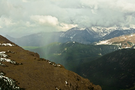Rain coming over the rocky mountains in the U S , Coloradoの写真素材