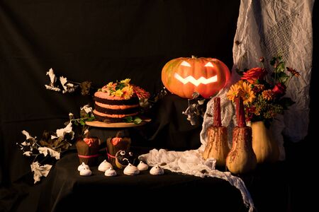 october decorations with pumpkin and cakeの写真素材