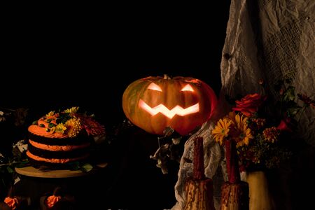 october decorations with pumpkin and cakeの写真素材