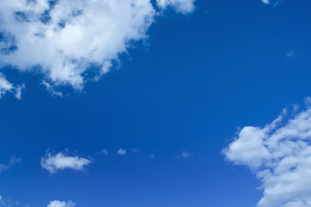 White clouds in a blue skyの写真素材