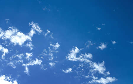 White clouds in a blue skyの写真素材