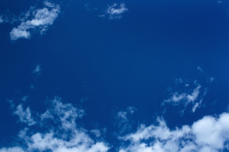 White clouds in a blue skyの写真素材