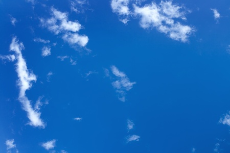 White clouds in a blue skyの写真素材