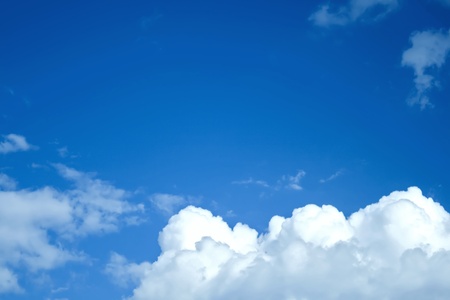 White clouds in a blue sky horizontalの写真素材