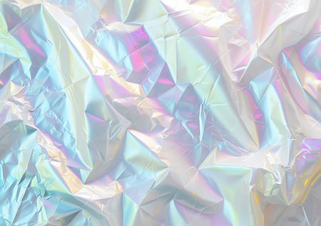 A close-up view of a crinkled white holographic foil showing a blend of colorful reflections across its uneven surface.の素材