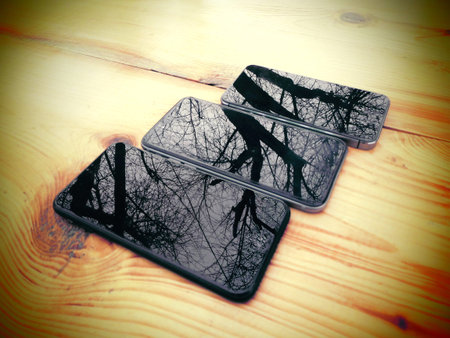 Three modern mobile phone. Cellular telephone. Fashionable.の写真素材