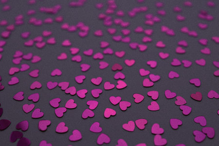 Beautiful heart confetti falling on the Very Peri background. Invitation Template Background design, greeting cards, poster. Valentines Day.の写真素材
