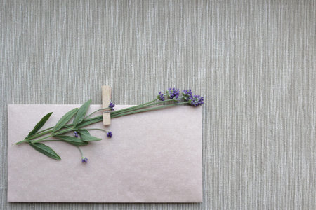 small bouquet of dry lavender on a vintage-style craft envelope. Happy Birthday, Valentines day,...