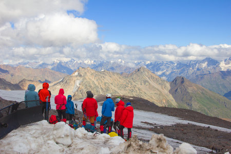 Elbrus region, Kabardino-Balkaria, Russia - August 16, 2020 : Cable car station Garabashi 3847 m above sea level. Climbers before climbing to the top of Mount Elbrus, the highest peak in Europe.のeditorial素材