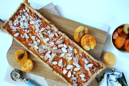 shortcrust pastry tart with homemade apricots and peachesの写真素材