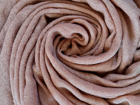 Fabric as background in Mocha mousse color of the year 2025 with earthy tone. Abstract wallpaper. Mocha Mousse tan texture abstractの写真素材