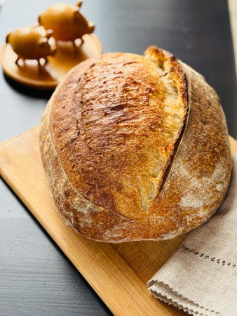 freshly baked sourdough bread with a textured, golden crust.