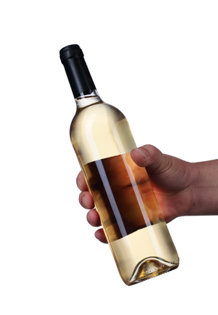 a bottle of wine held in your handの写真素材