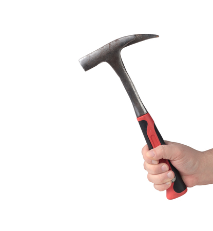 hammer in a hand on a white backgroundの写真素材