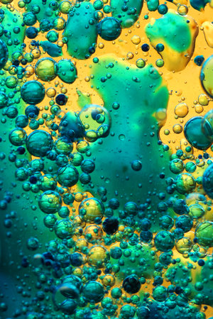 oil bubbles on glass and colored background