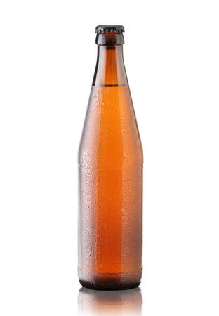 glass brown bottle with beer on a white backgroundの写真素材