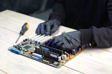 replacement of the chipset cooling system from the computer motherboard on the tableの写真素材