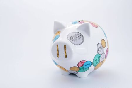 Piggy bank on a gray backgroundの写真素材