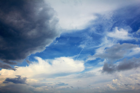 Beautiful clouds over blue sky background 