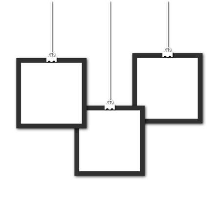 three suspended on a thread square photo frames with shadow on isolated on white background. Template for decoration and interior.の写真素材