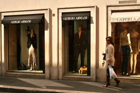 Rome, lazio, italy, march 06. 2007, lady on shopping tour in front of shopping stores Via Condotti, Giorgio Armani, La Perla,のeditorial素材