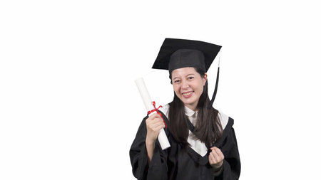 college girl in gown hold diploma and Celebrates new job joyful.