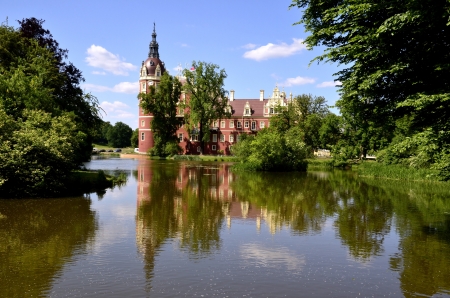 This beautiful castle surrounded by gardens in the English style of the 19th century was inspired by Prince Hermann Pueckler-Muskau  Muskauer Park is part of UNESCO World Heritage Site  It is located on both sides of the Neisse River which is the Polish aのeditorial素材