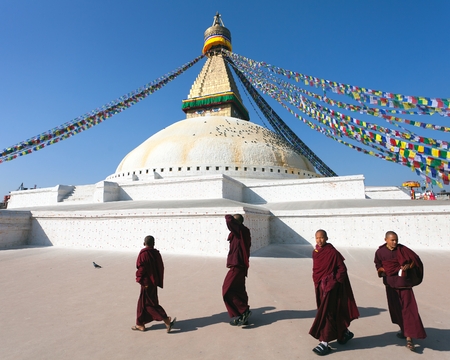 Nepal, Kathmandu -17th of December 2013  Tibetan Buddhist monks walking around Boudhanath stupa during festival のeditorial素材